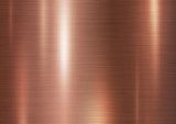 Kupferne Metallstruktur mit Lichtreflexen