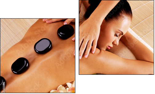 Adult woman having hot stone massage in spa salon - Zweiteiliges Leinwandbild, Diptychon