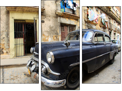 A classic old car is black color parked in front of the building - Dreiteiliges Leinwandbild, Triptychon