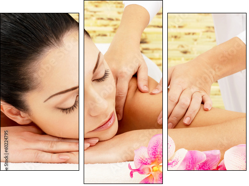 Woman having massage of shoulder in spa salon - Dreiteiliges Leinwandbild, Triptychon