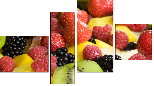 Delicious fruit salad served in a bowl - Vierteiliges Leinwandbild, Viertychon