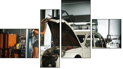 A beautiful brunette woman in a garage fixing an old car - Vierteiliges Leinwandbild, Viertychon
