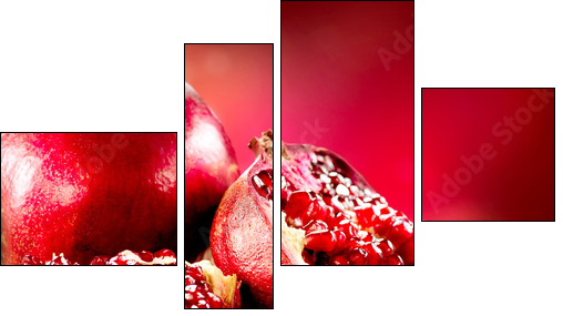 Pomegranates over Red Background. Organic Bio fruits - Vierteiliges Leinwandbild, Viertychon