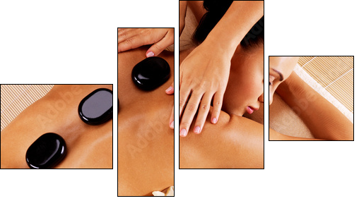 Adult woman having hot stone massage in spa salon - Vierteiliges Leinwandbild, Viertychon