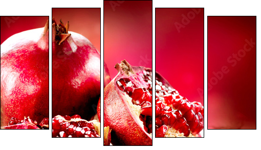 Pomegranates over Red Background. Organic Bio fruits - Fünfteiliges Leinwandbild, Pentaptychon